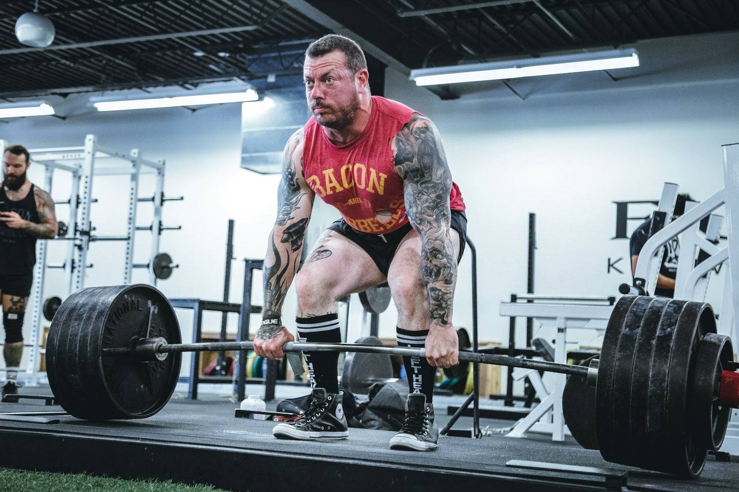 Athlete performing a heavy barbell deadlift